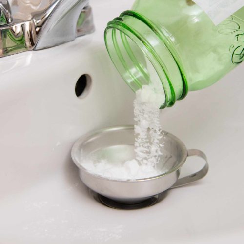 Why should you never use baking soda and vinegar to unclog a drain?